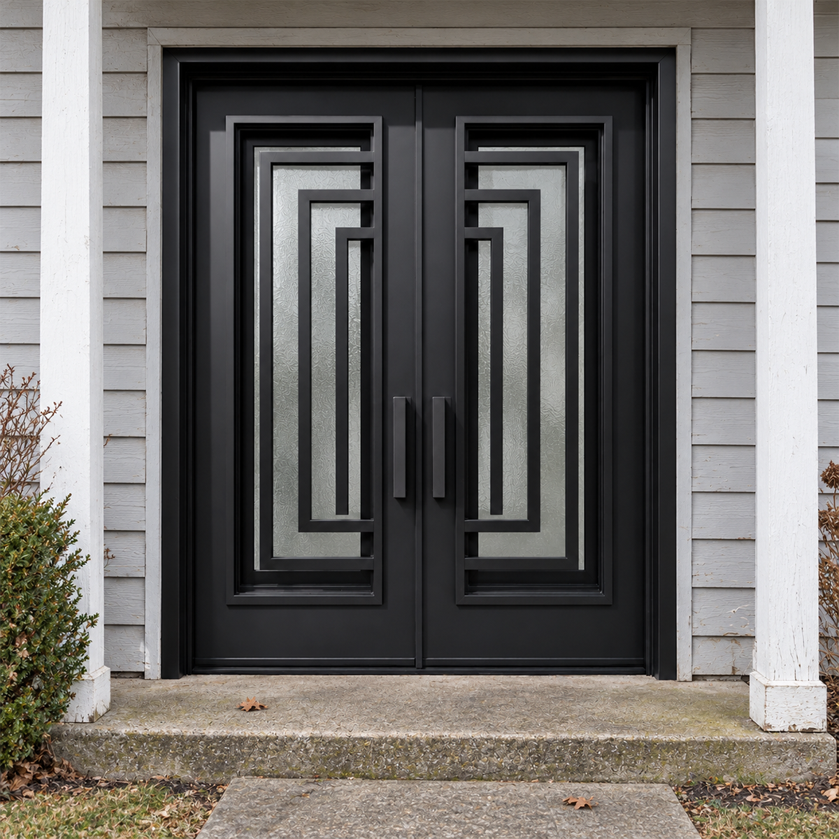 Black double modern iron doors with stepped rectangular ironwork and textured glass at a covered porch