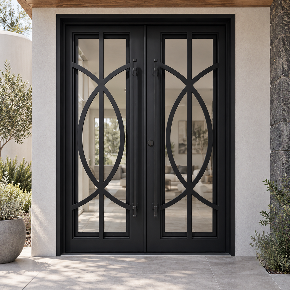 Black double traditional iron doors with sweeping intersecting curves and tall glass panels in a stucco and stone entrance